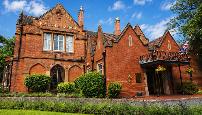 Plough and Harrow Hotel outdoor wedding ceremony