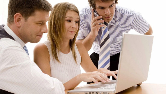 3 people with laptop