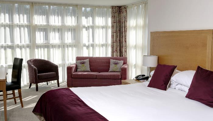 Family Deluxe bedroom overlooking the Balgeddie House Hotels garden Family Deluxe bedroom overlooking the Balgeddie House Hotels garden