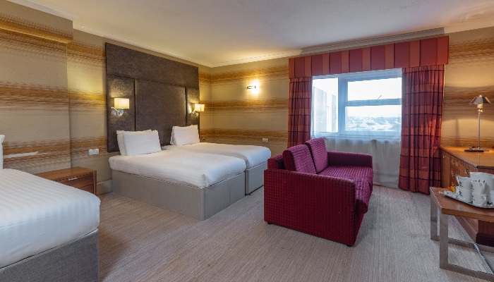 Suite with double bed and two double sofa beds